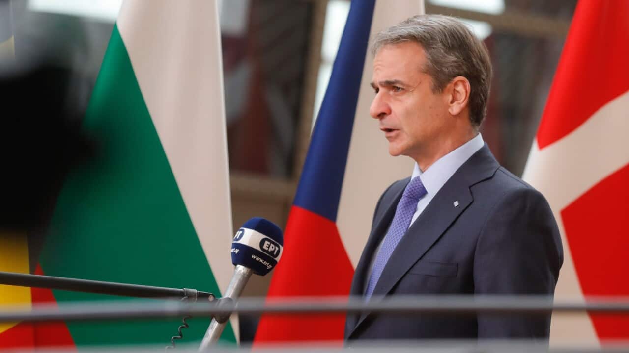 Greek Prime Minister Kyriakos Mitsotakis arrives at the first day of a Special European Summit on Ukraine at the European Council, in Brussels, 30 May 2022.