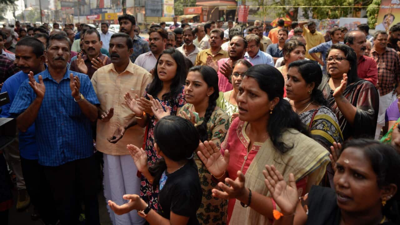 A protest against reports of two women of menstruating age entering the Sabarimala temple in Kerala