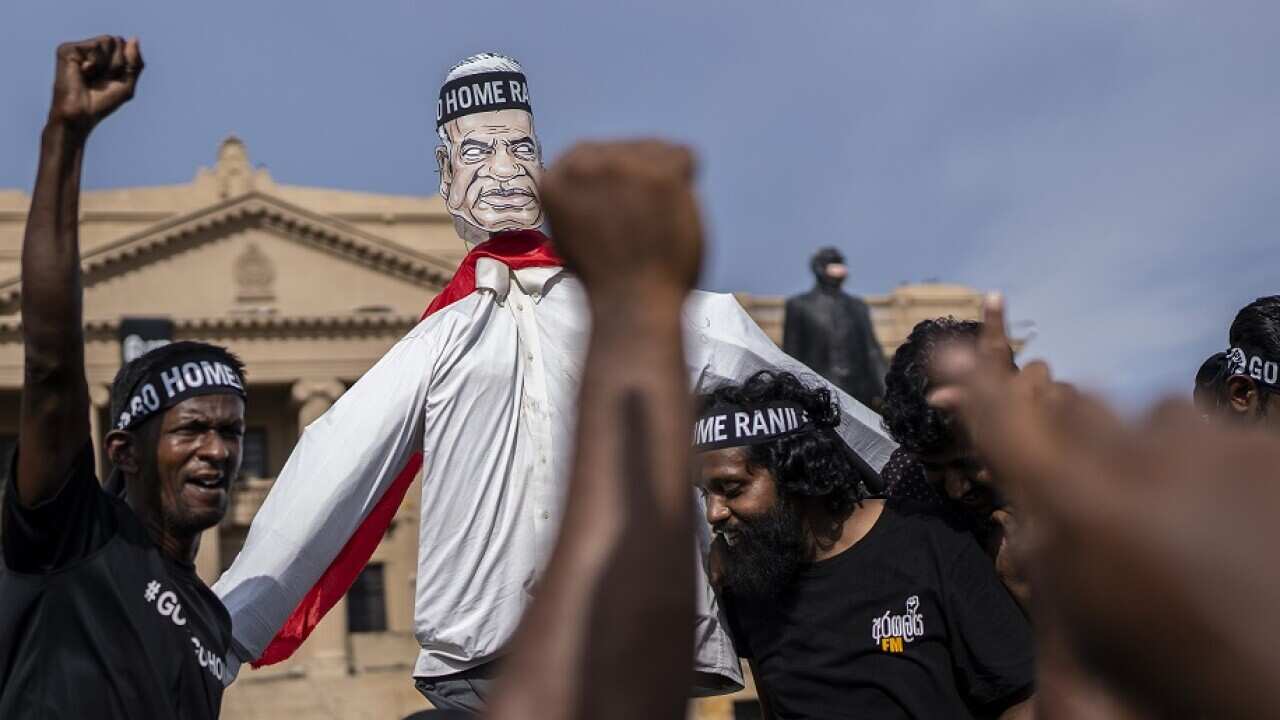 Protesters shout slogans demanding Ranil Wickremesinghe resign in Colombo, Sri Lanka