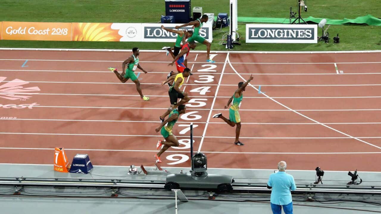 Akani Simbine of South Africa crosses the line to win gold in the Men's 100 metres final during the Athletics on day five of the Gold Coast 2018 Commonwealth Games at Carrara Stadium on April 9, 2018 on the Gold Coast, Australia.