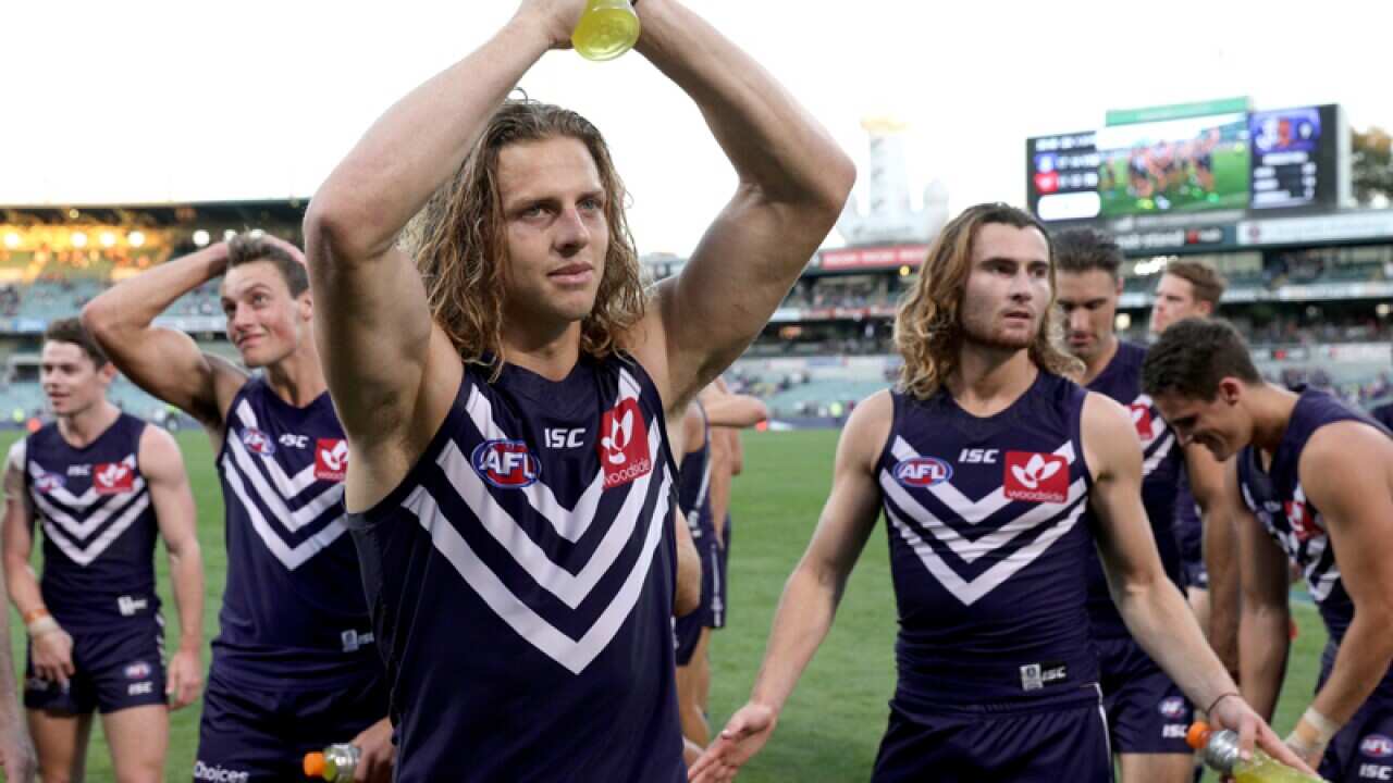 Nat Fyfe of the Dockers celebrates after winning the Round 7 AFL