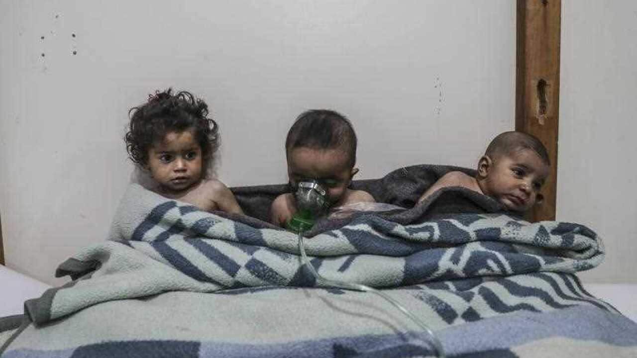Affected children receive treatment after a gas attack on al-Shifunieh village, in Eastern Ghouta, Syria, 25 February 2018