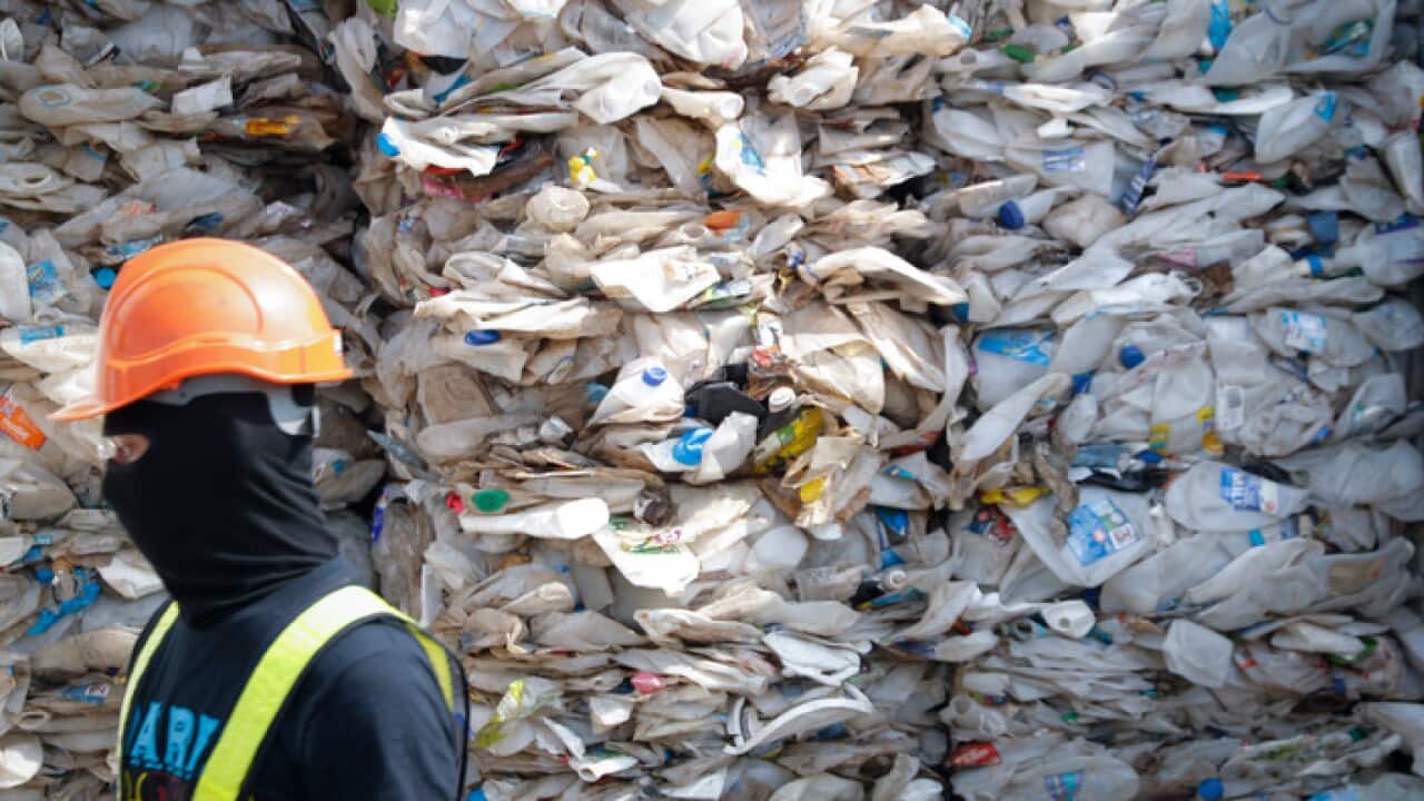 A container is filled with plastic waste from Australia, in Port Klang, Malaysia