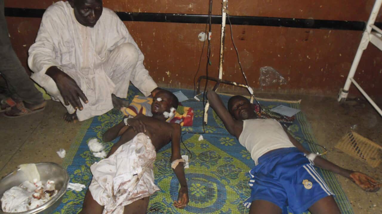 People are treated at a hospital after a suicide bomb attack