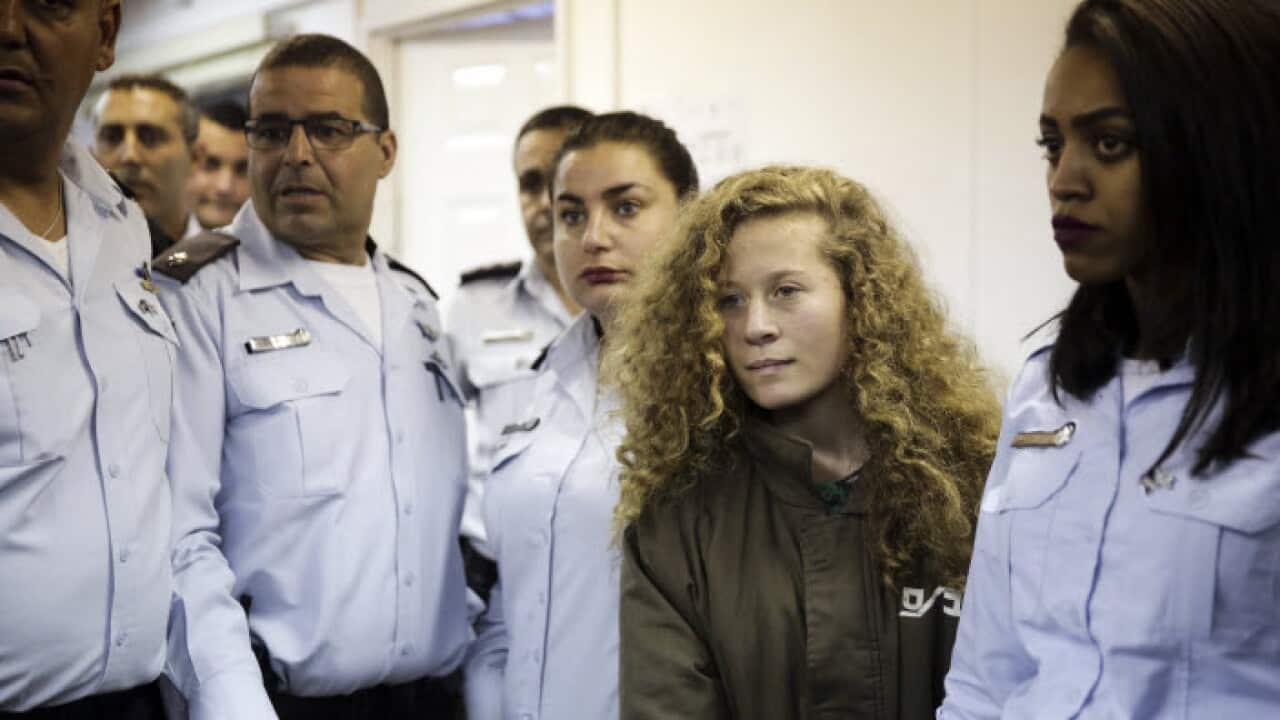 Ahed Tamimi is brought to a courtroom inside Ofer military prison near Jerusalem