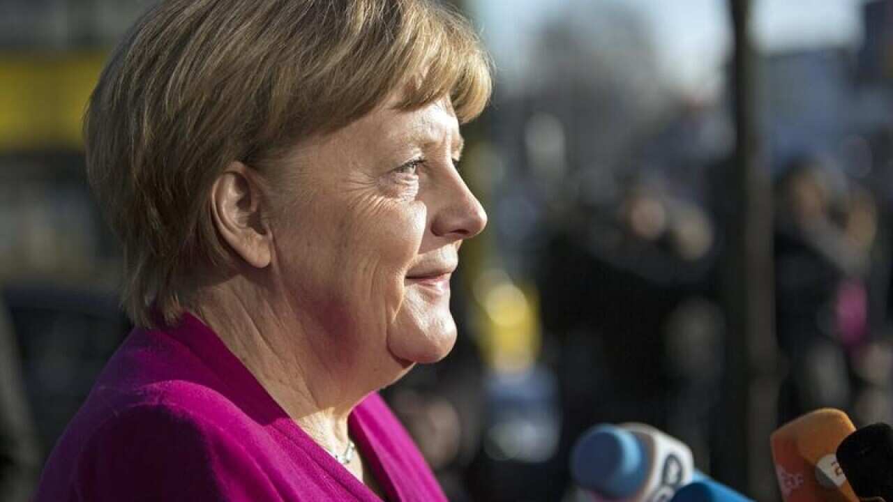 Angela Merkel, arrives for coalition talks.