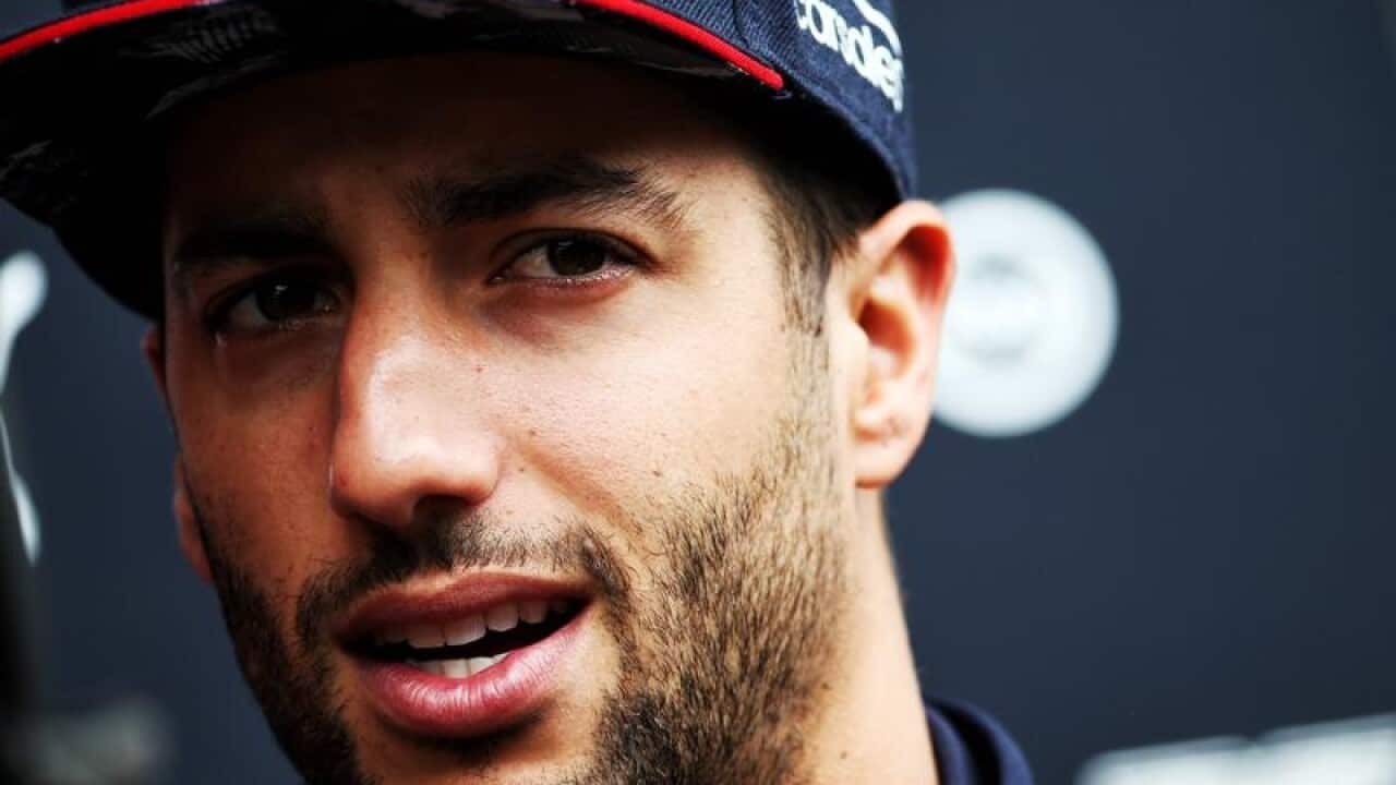 Daniel Ricciardo looks on