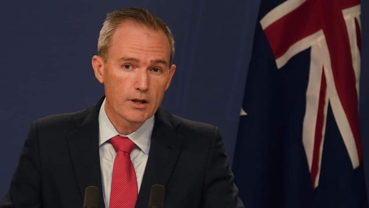 Immigration Minister David Coleman at a press conference.