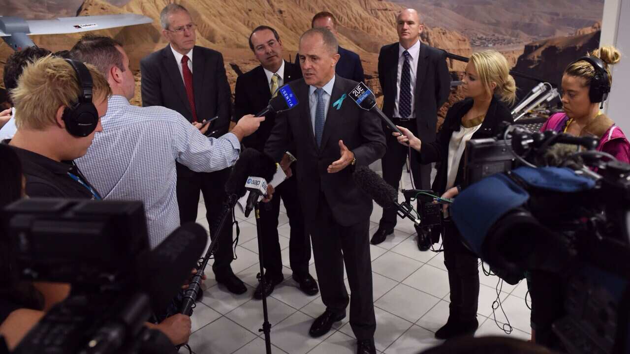 Federal Minister for Communications Malcolm Turnbull at a news conference in Queanbeyan, Wednesday, Feb. 25, 2015. (AAP Image/Mick Tsikas) NO ARCHIVING