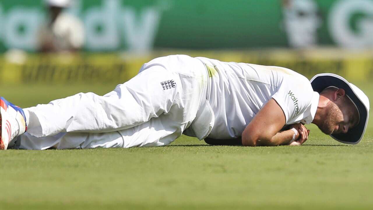 England's Stuart Broad reacts in pain
