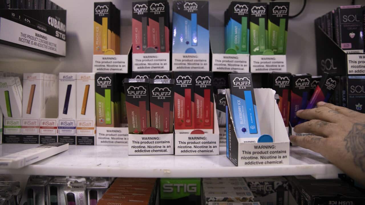 This Jan. 31, 2020 photo shows various brands and flavors of disposable vape devices at a store in the Brooklyn borough of New York. (AP Photo/Marshall Ritzel)