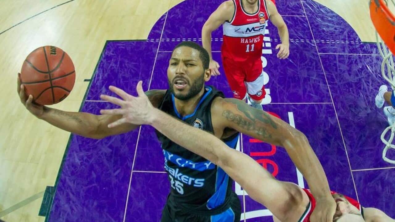 Devonte Newbill of the Breakers against Andrew Ogilvy of the Hawkes