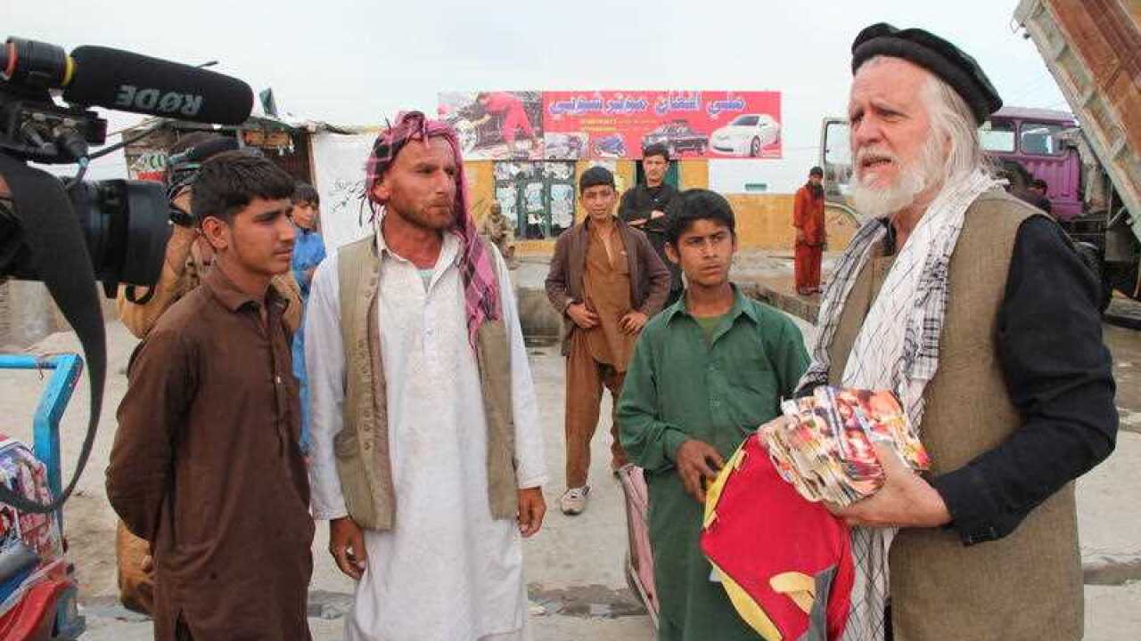 Artist and filmmaker George Gittoes directing a film in Jalalabad, Afghanistan in 2014.