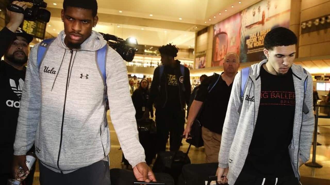 UCLA basketball players leave the LA International Airport
