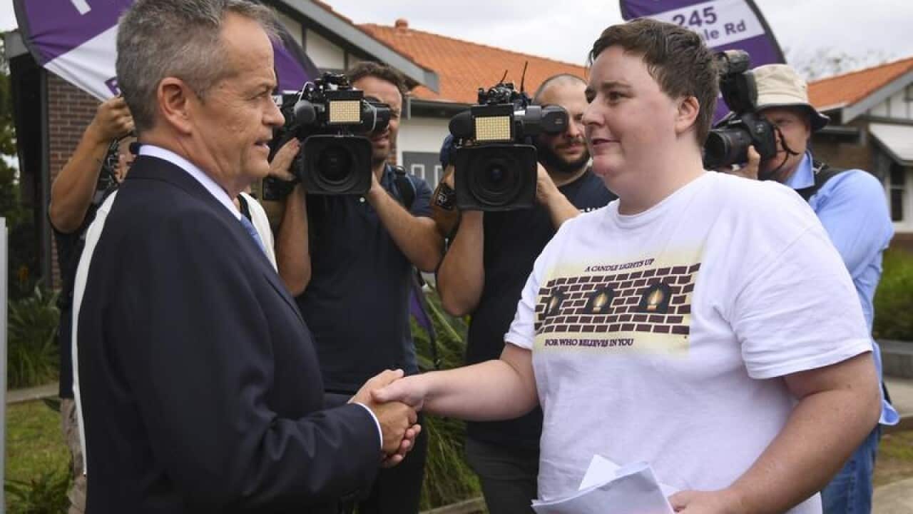 Opposition Leader Bill Shorten (left)