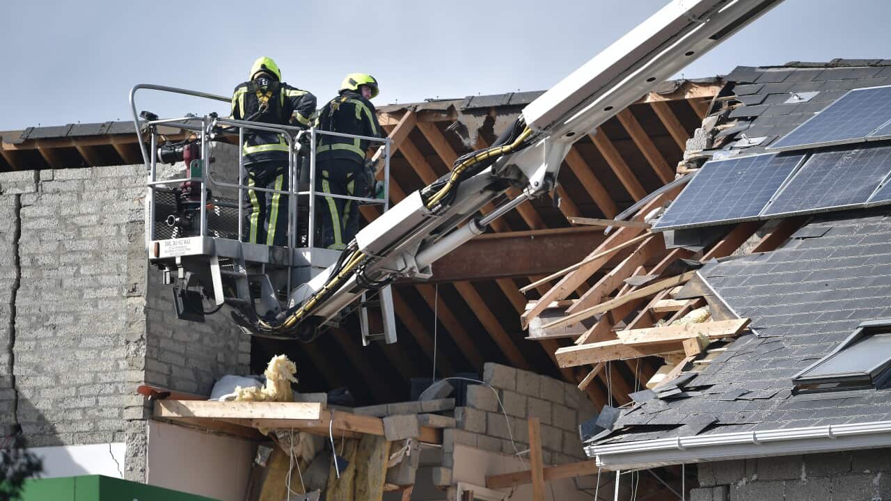 Emergency service workers at the scene of a petrol station explosion in Ireland.