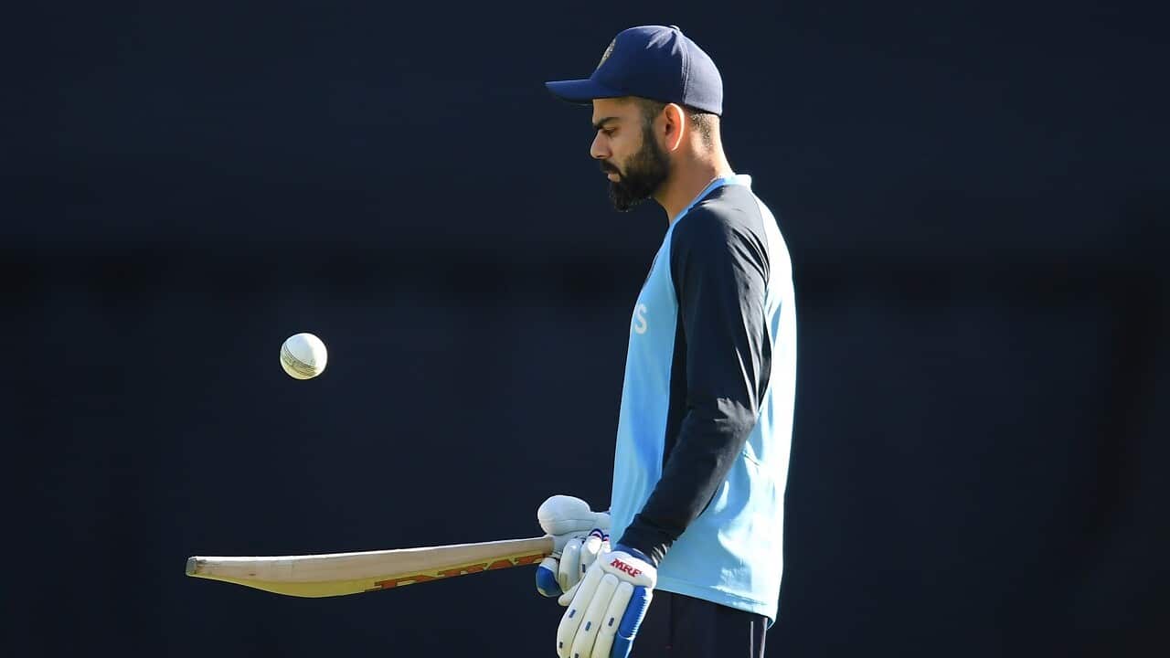 Virat Kohli of India warms up ahead of play in the third T20 cricket match between Australia and India at the SCG, Sydney, Tuesday, December 8, 2020.