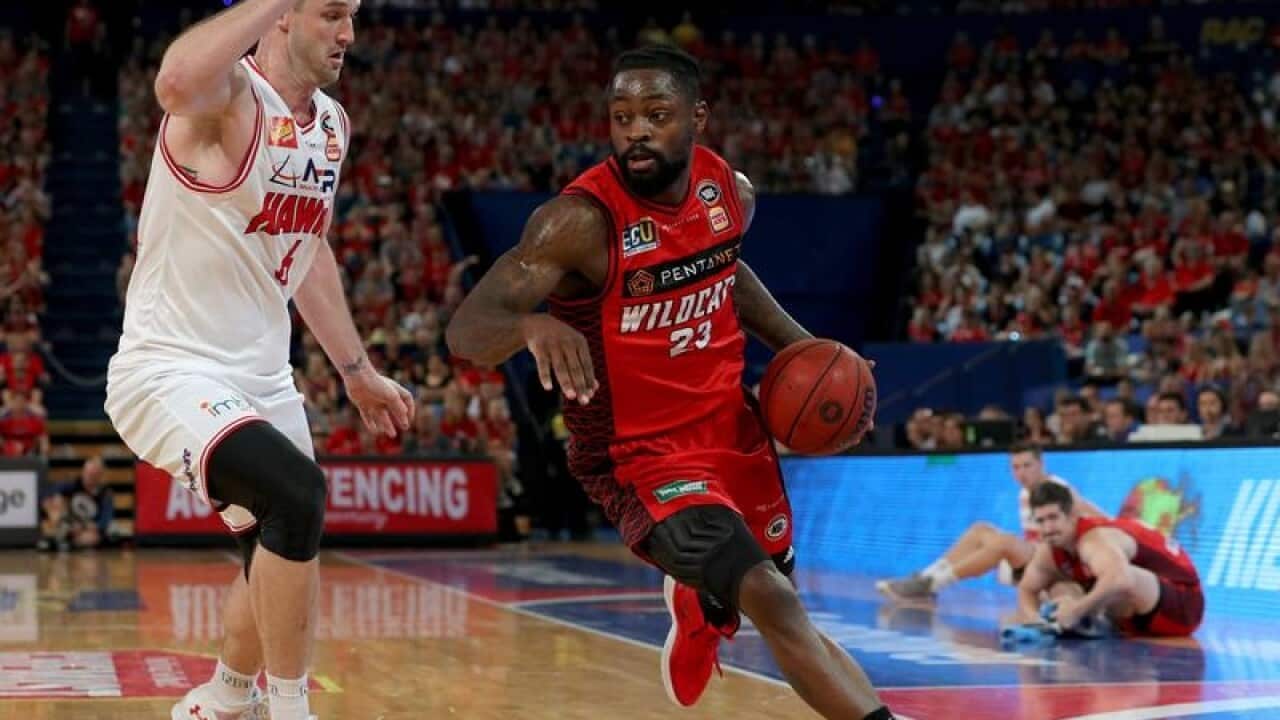 Perth Wildcats star Terrico White (R)