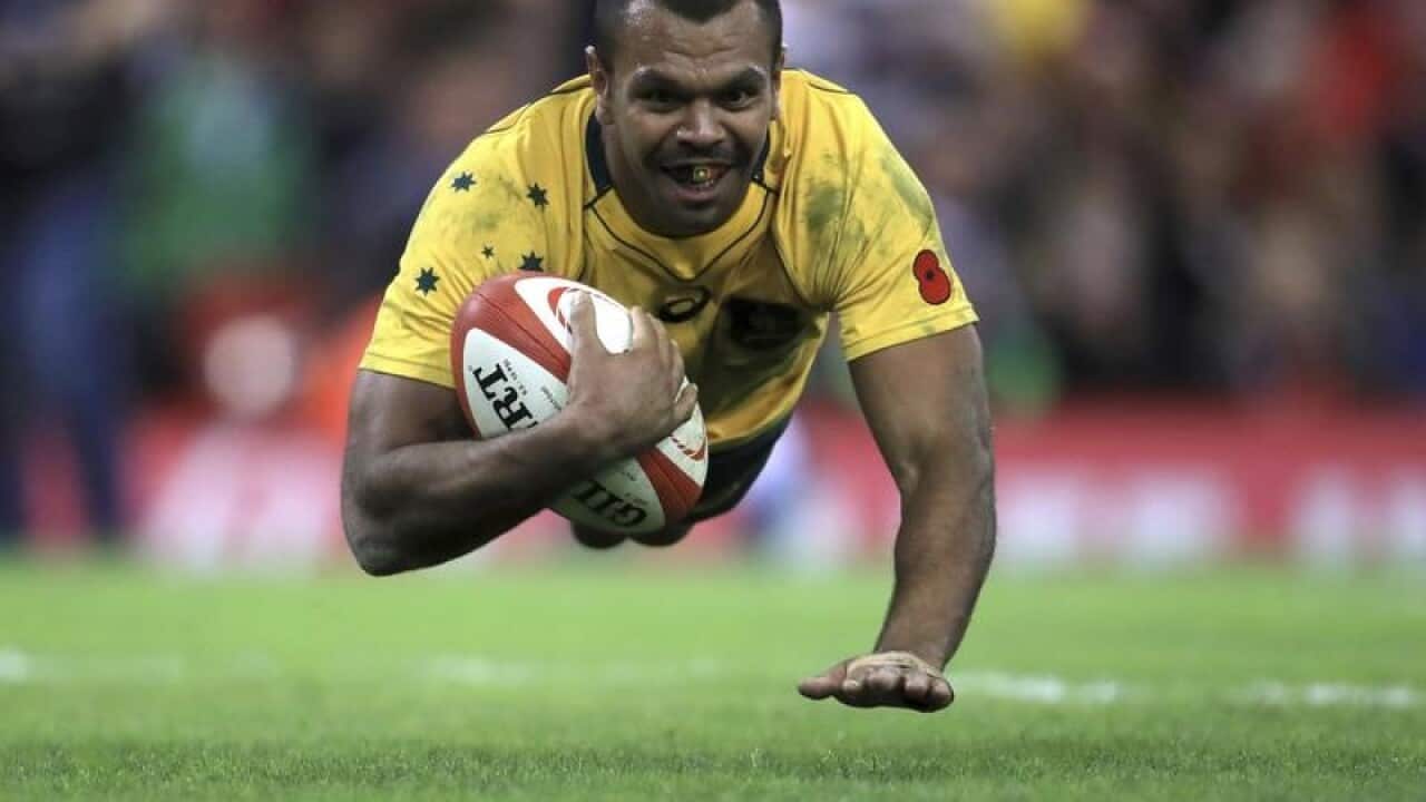 Kurtley Beale scores a runaway try for Australia.