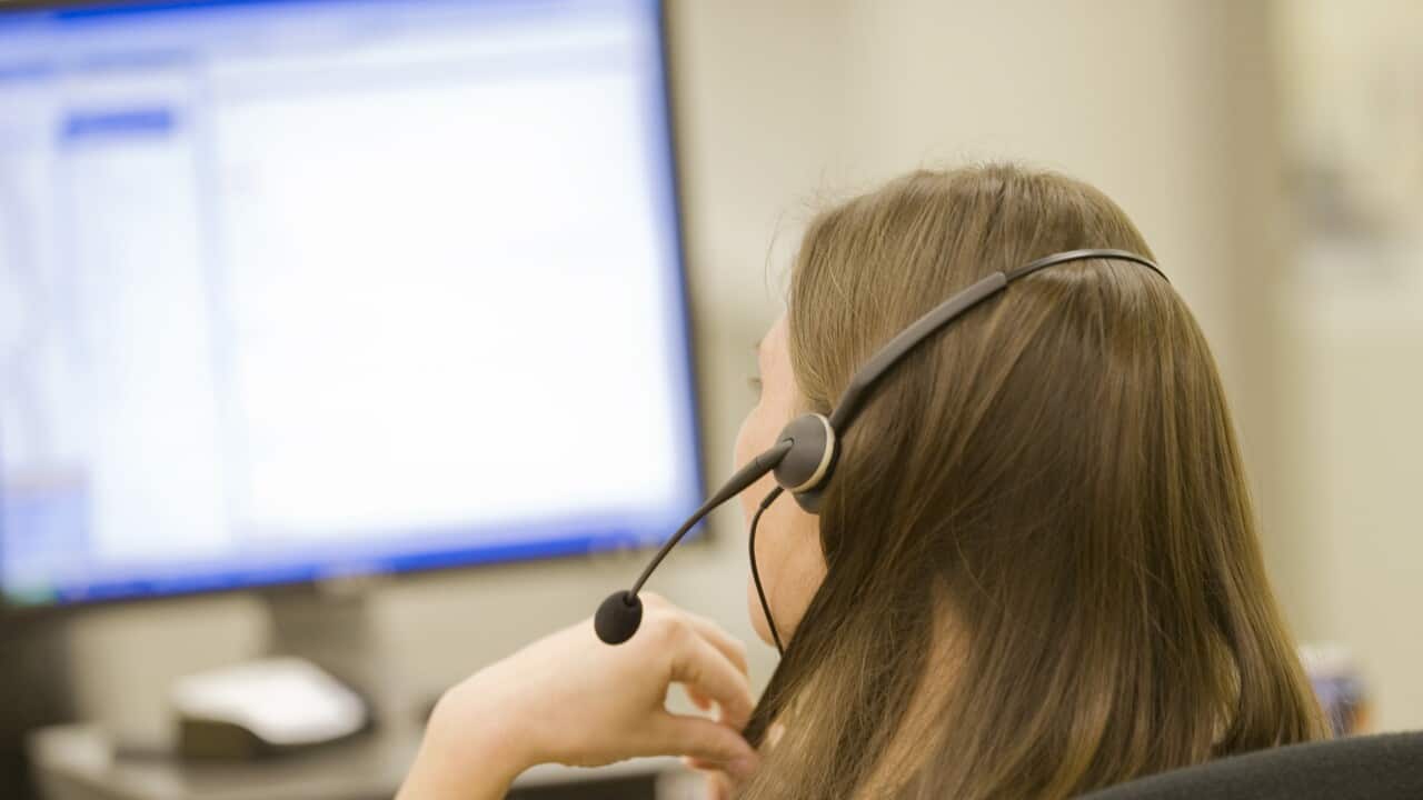 Woman in call center on phone
