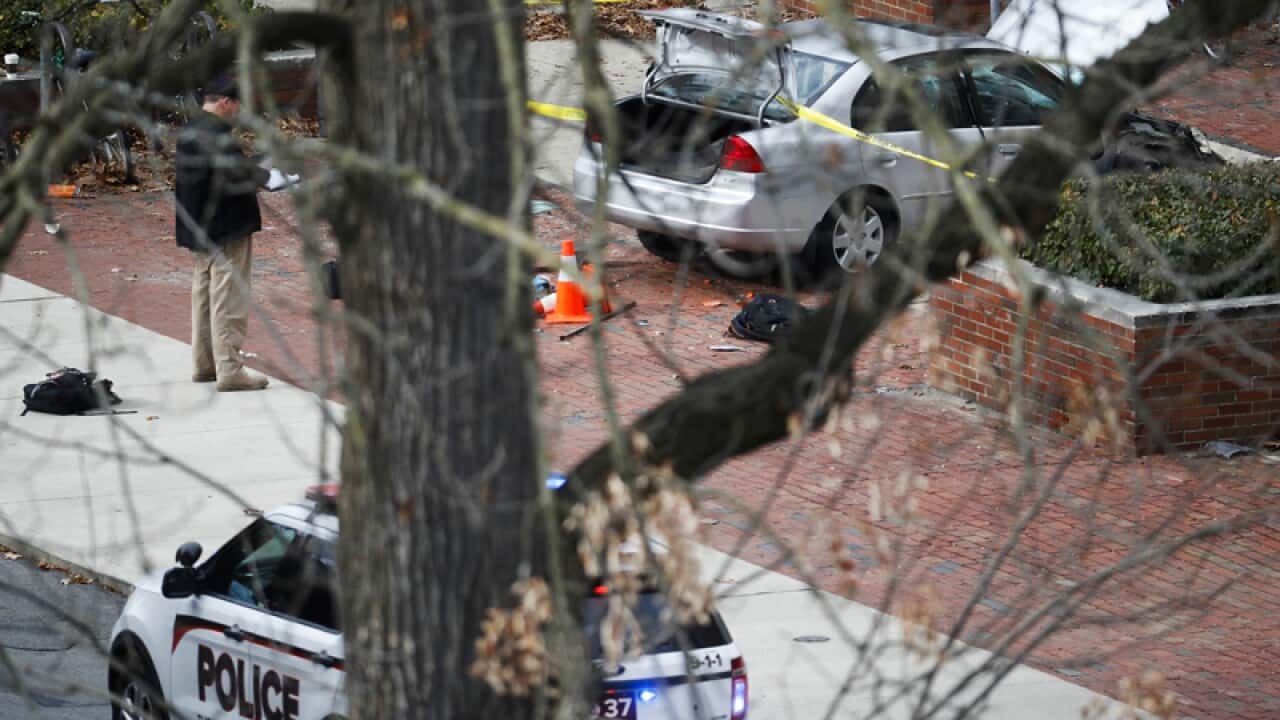A car inside a police line following an attack at Ohio State
