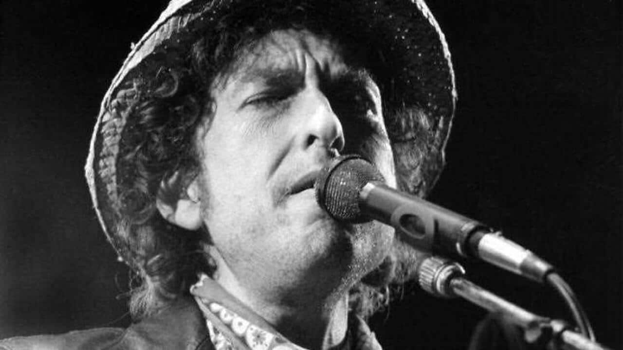 A file picture dated 03 June 1984 shows US musician Bob Dylan performing at an open air concert at the Olympic Stadium in Munich, Germany (AAP)