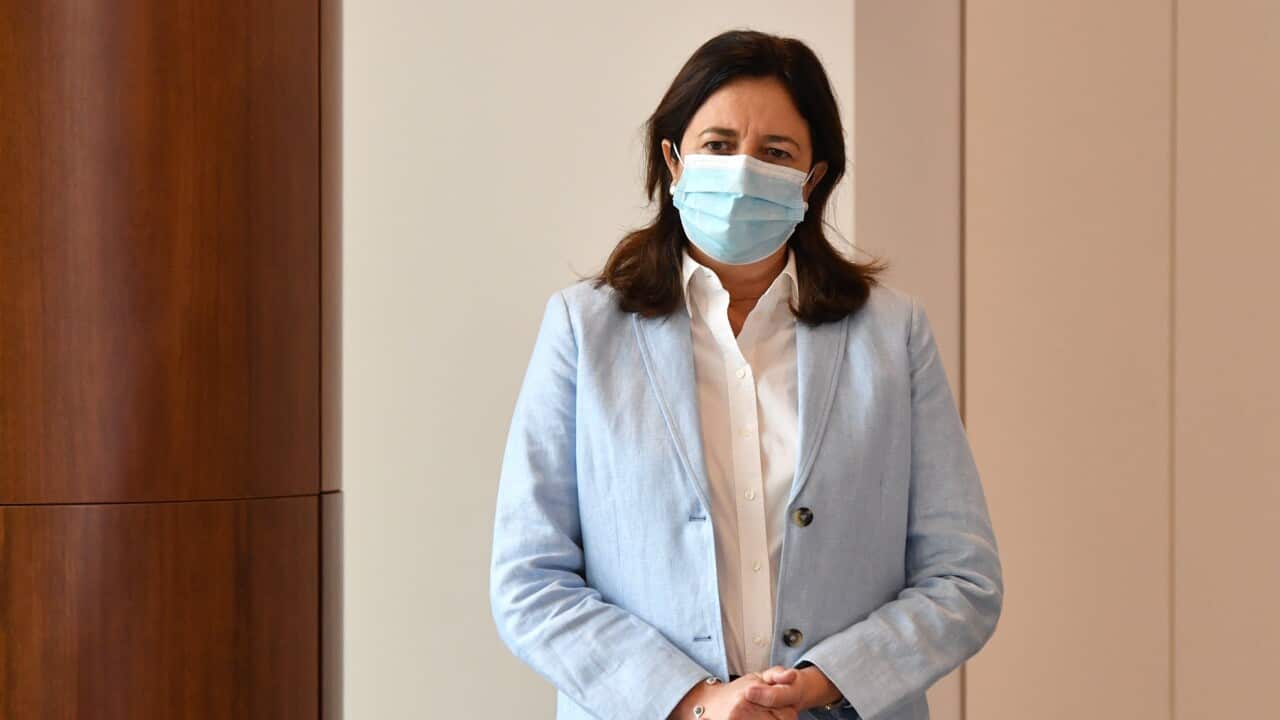 Queensland Premier Annastacia Palaszczuk wears a mask