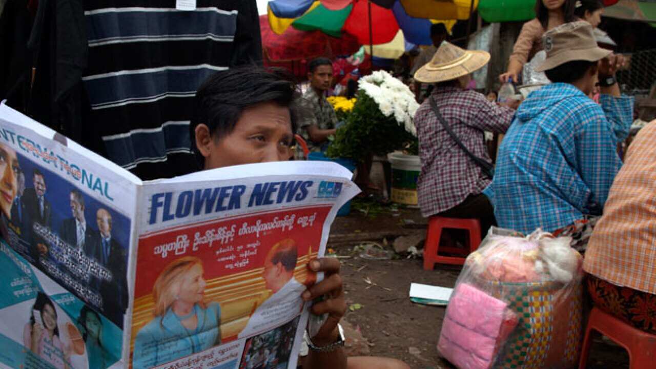 burma_clinton_paper_L_120927_getty_205380936