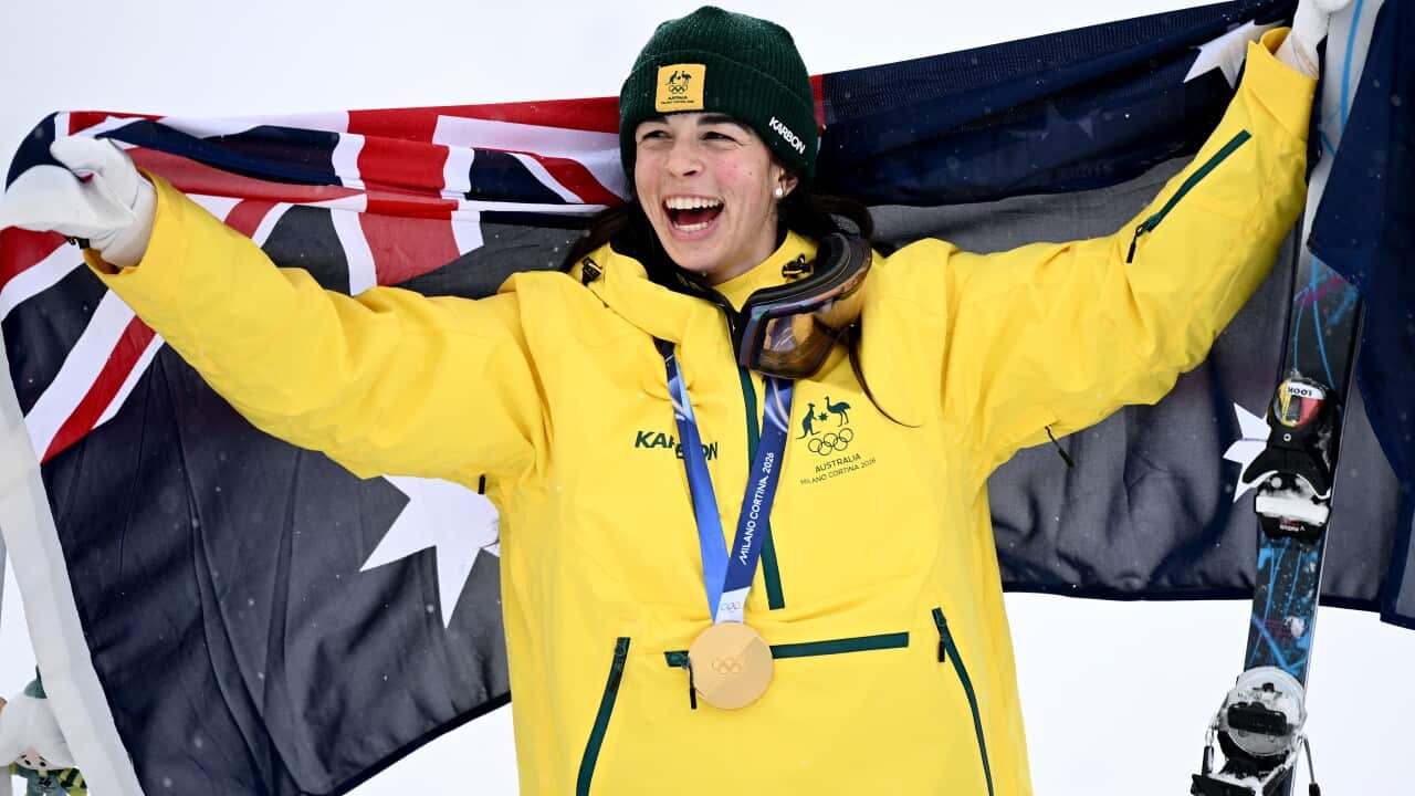 Jakara Anthony of Australia celebrates after being presented the Gold medal during the victory ceremony for the Women’s Dual Moguls Final at the Livigno Aerial and Moguls Park on day 8 of the 2026 Milano Cortina Winter Olympic Games in Livigno, Italy, Wednesday, February 11, 2026