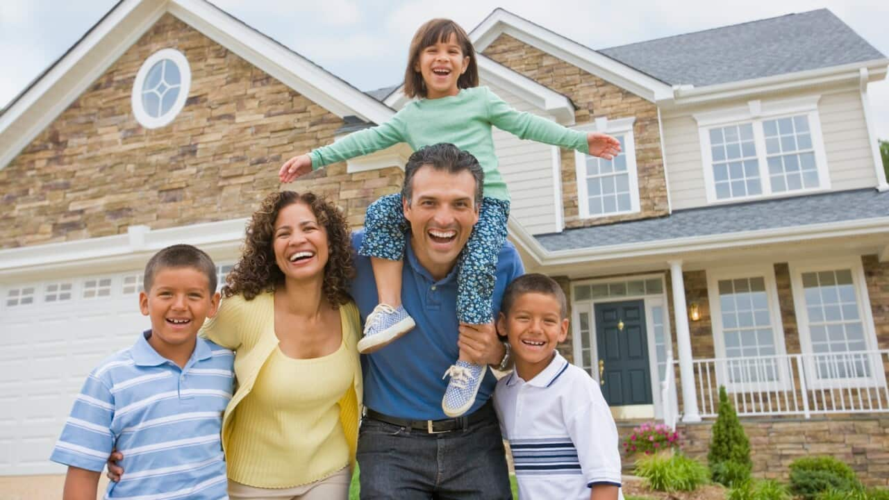 A family infront of their house