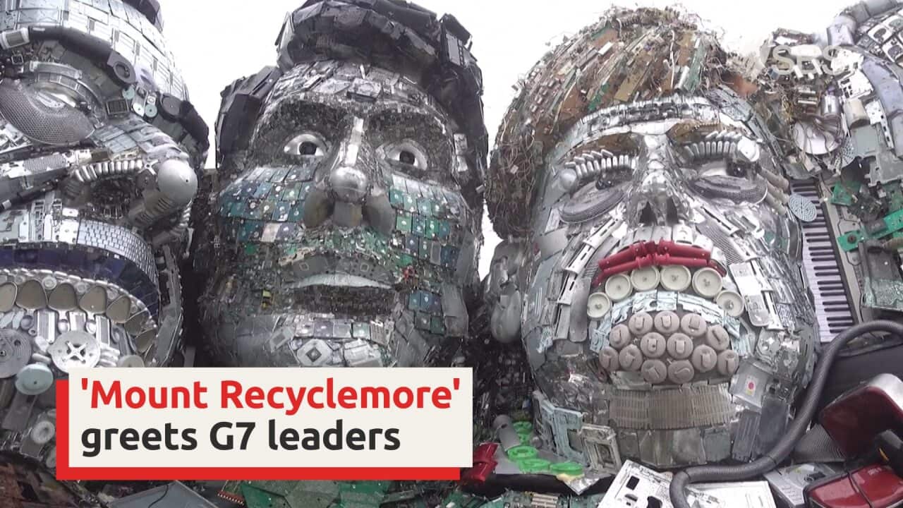Artists create giant e-waste 'Mount Recyclemore' sculpture of G7 leaders