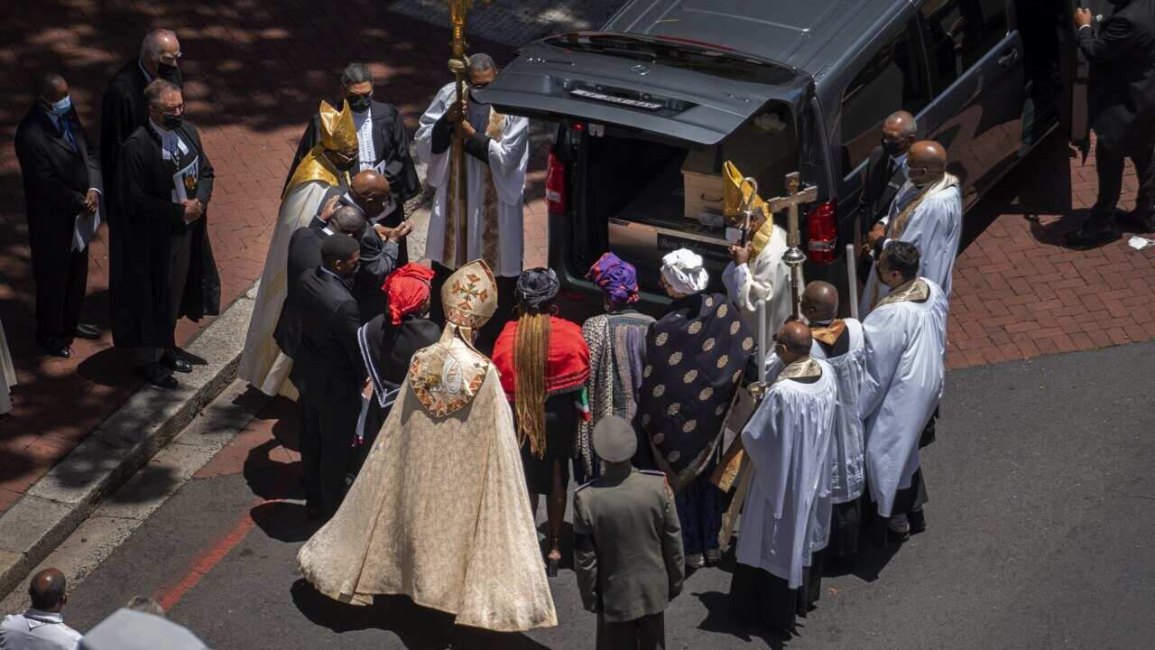 Relatives at the casket for Anglican Archbishop Desmond Tutu