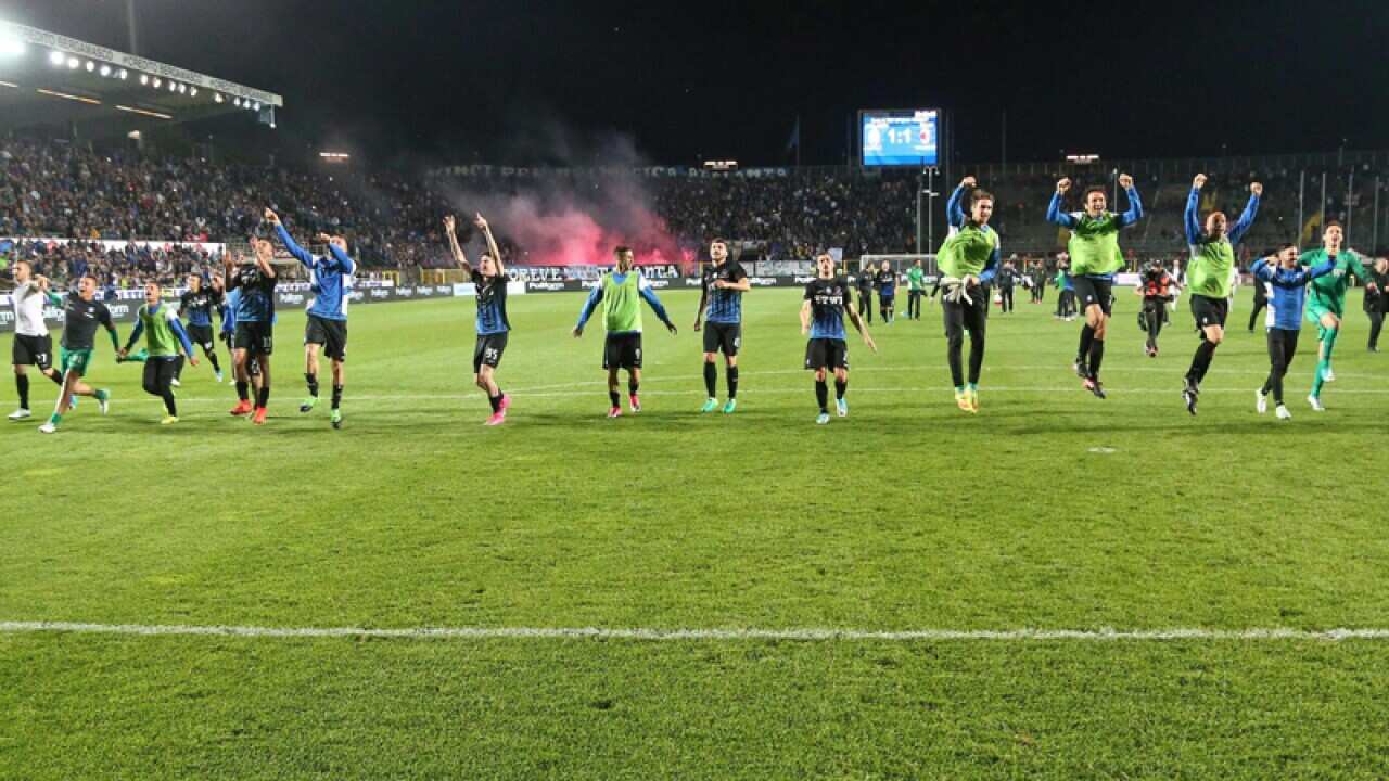 Atlanta's players celebrate at the end of the Serie A soccer match