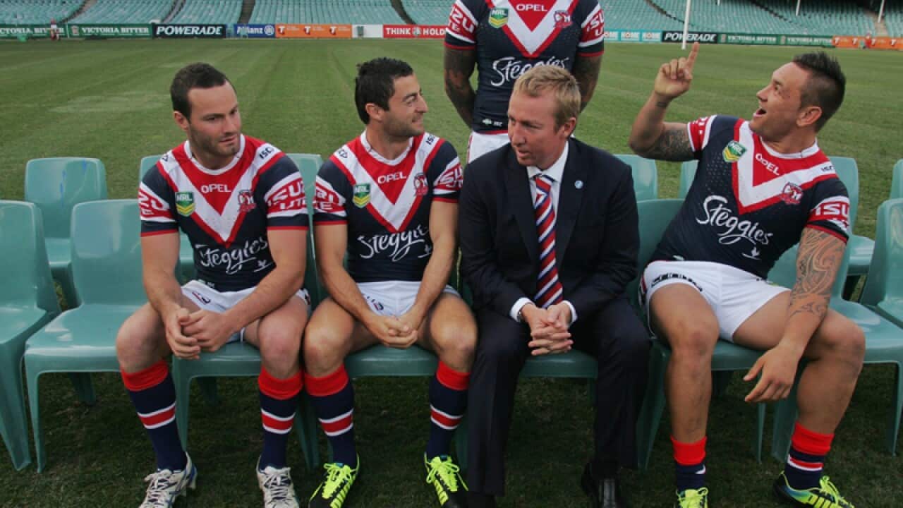 Sydney Roosters coach Trent Robinson (centre)