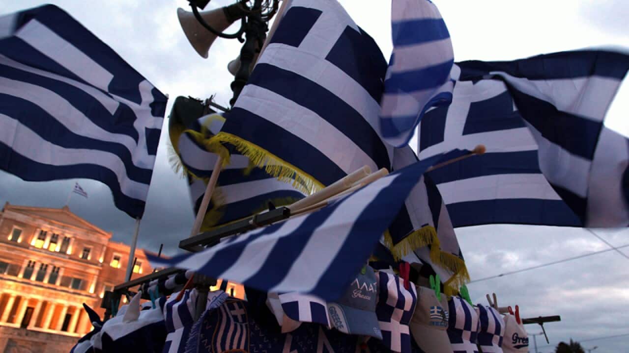 Greek flags during a rally in Athens