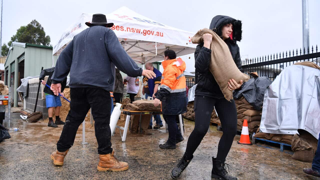 SES volunteers at Penrith SES making and providing free sandbags to residents, Sydney, Saturday, 20 March , 2021.