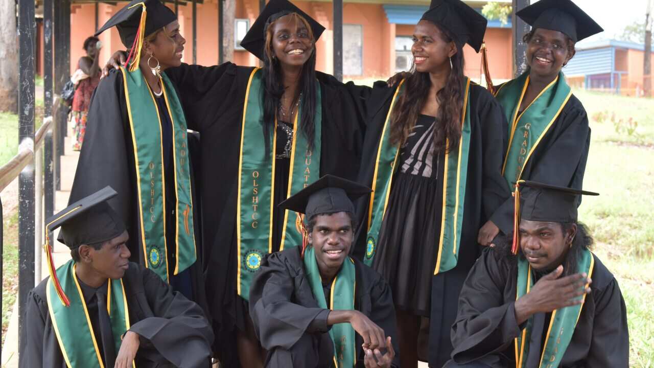 The students at their graduation ceremony.