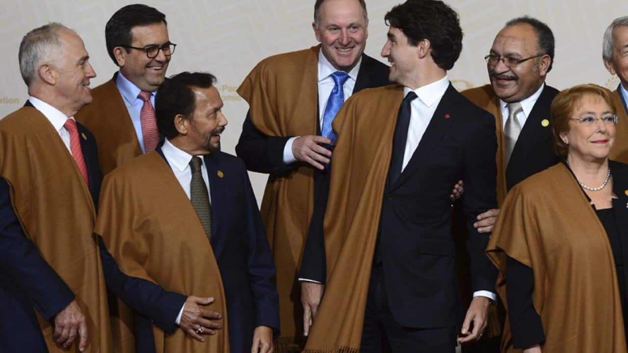 APEC leaders as they take part in the official family photo