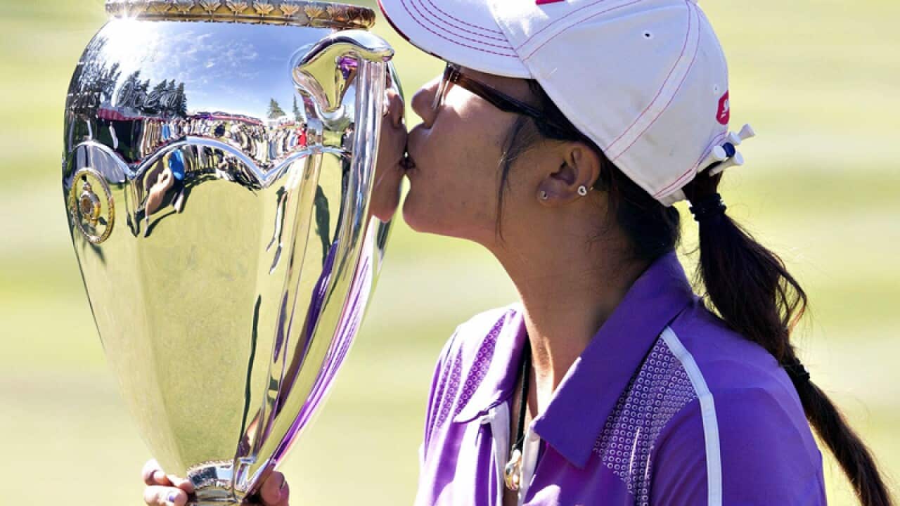 Lydia Ko celebrates winning the LPGA Canadian Women's Open