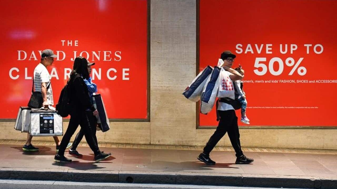 Shoppers are seen outside the David Jones department store