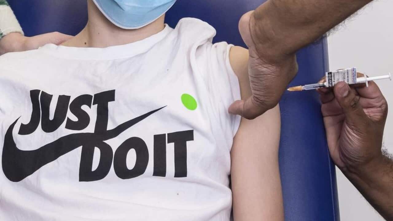 A person receives a Pfizer COVID vaccination (file image)