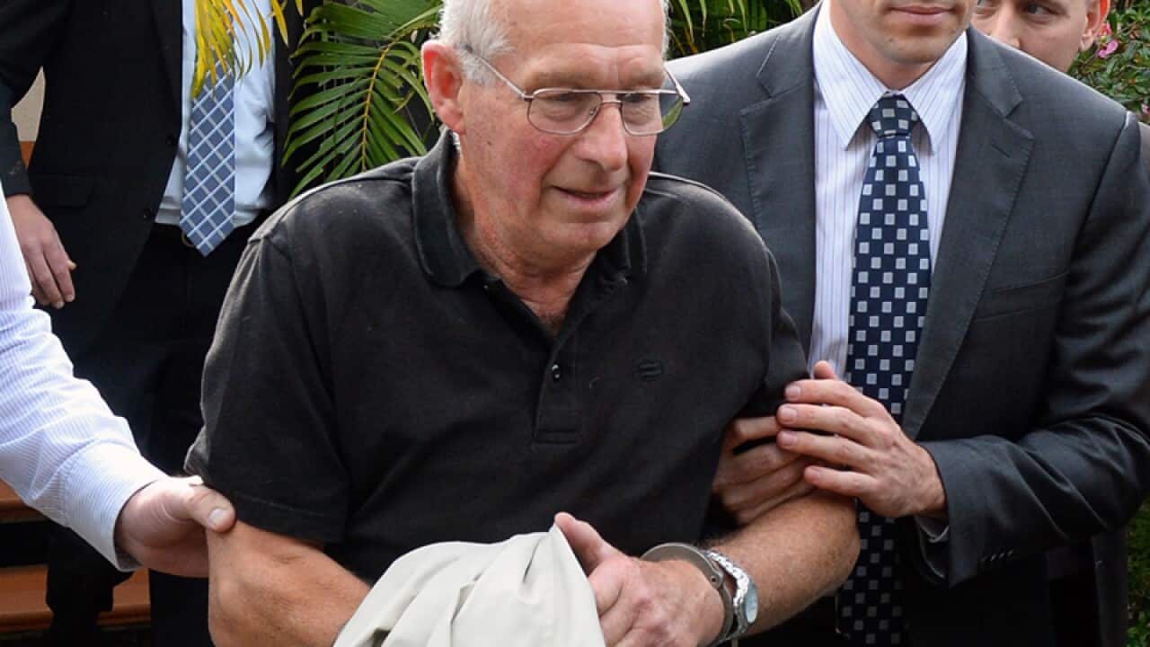 Roger Rogerson is taken into custody by NSW Police