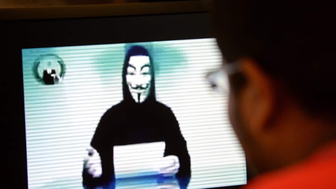 A person claiming to speak for activist group Anonymous in a video