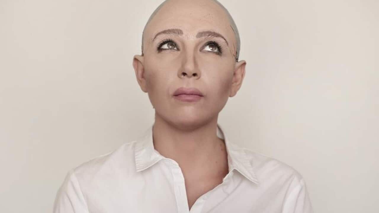 Egyptian satirist Sherine Arafa dressed up as 'Sophia the Robot'