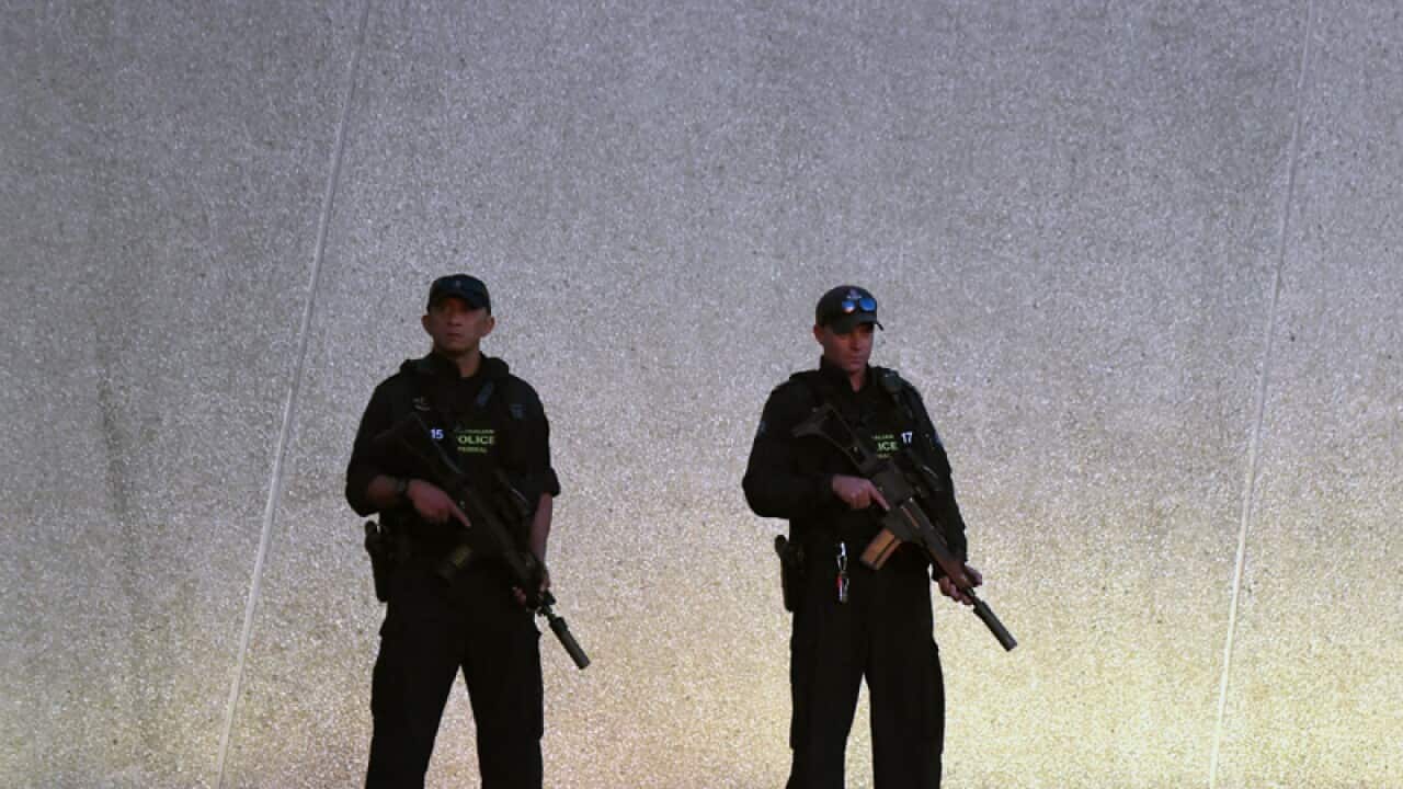 Armed Australian Federal Police officers