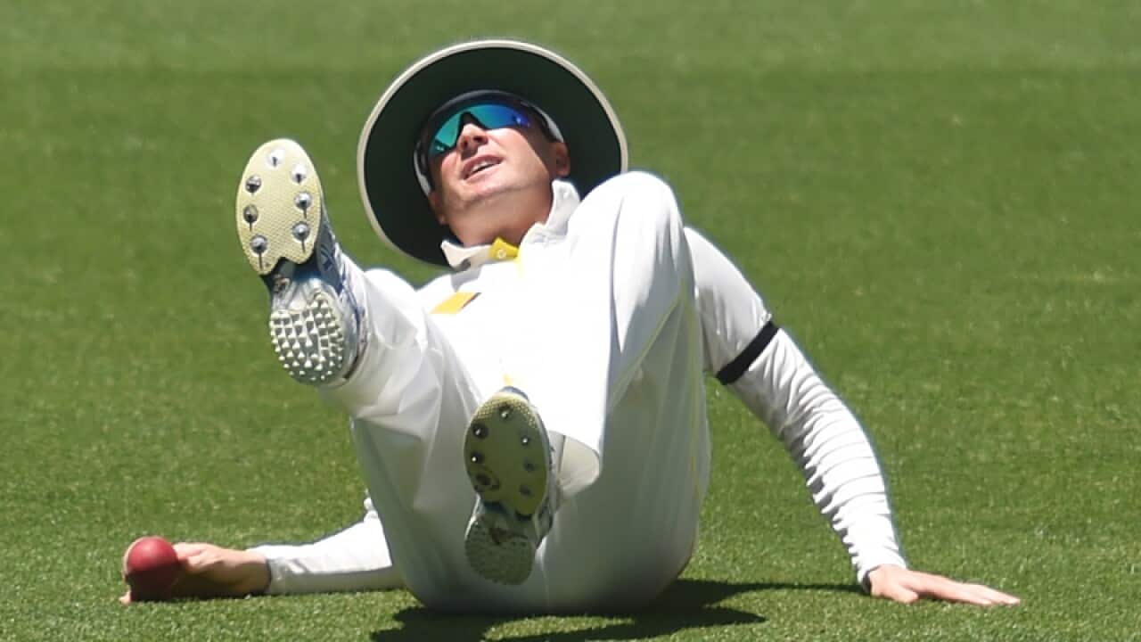 Michael Clarke falls after sustaining a hamstring injury