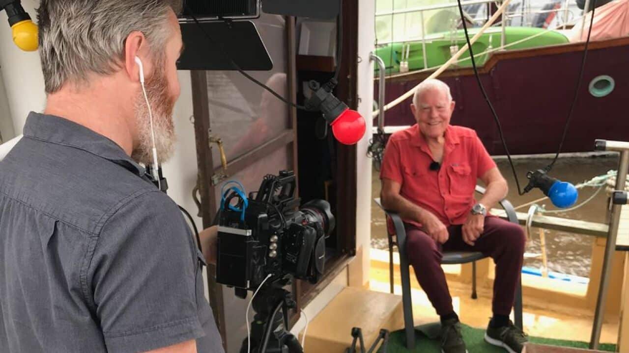 Klaas Nierop on his houseboat being filmed by director Simon Baker of The Bakery Media Production