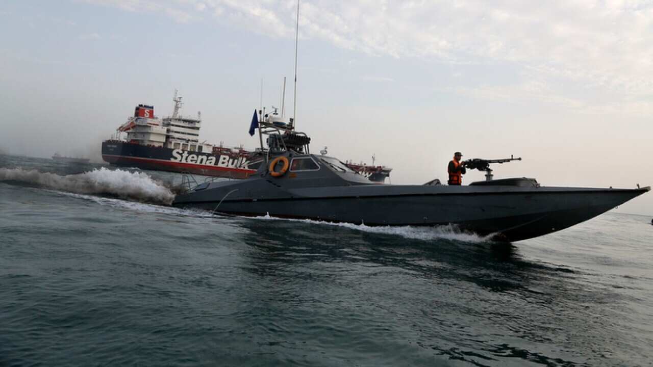 An Iranian Revolutionary Guard boat moves around British-flagged oil tanker Stena Impero in the Iranian port of Bandar Abbas (AAP).