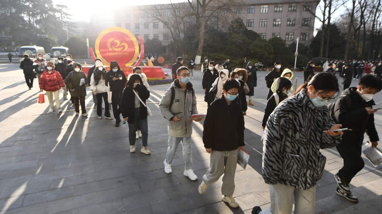 Some Chinese students in line for an examination
