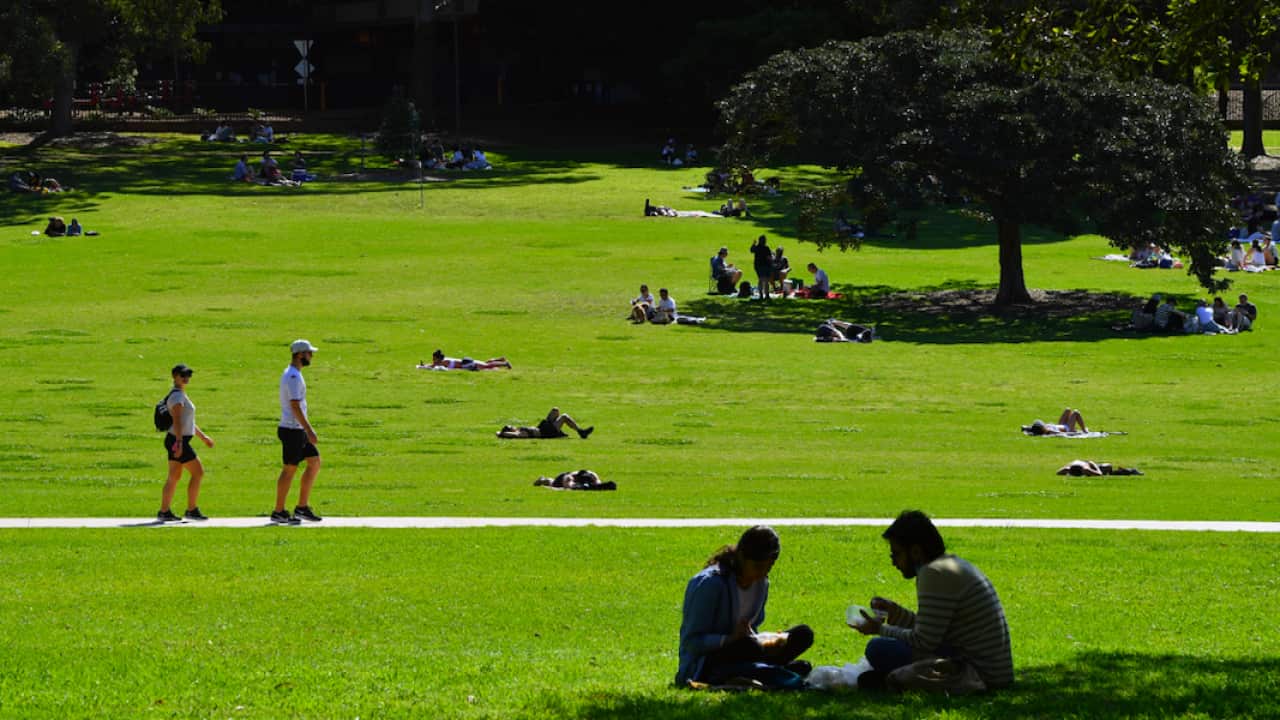 Locals gather at Victoria Park after picnic restrictions were lifted in Sydney, Sunday 19 September.